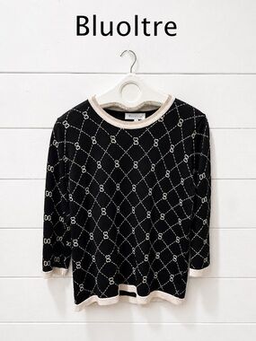Elegant knit top by Bluoltre, size M/L. Black
